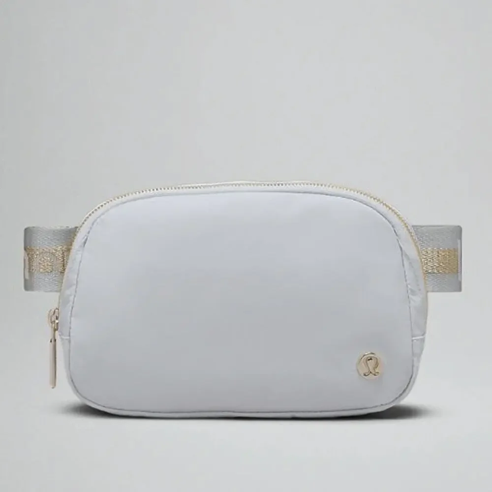 NEW Lululemon Everywhere Crossbody Belt Bag 1L Wordmark - Gray Silver and Gold